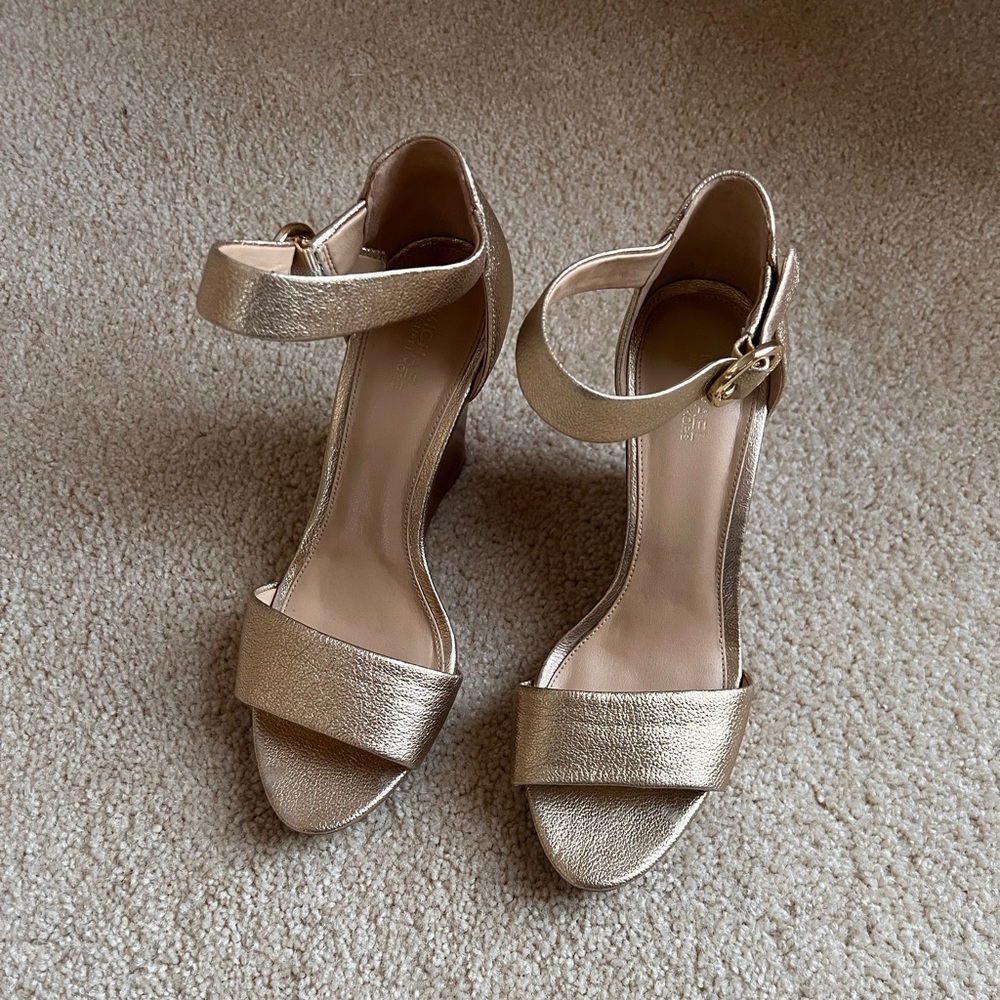 Gold, Michael Kors, wedge ankle strap sandal with buckle in great condition.